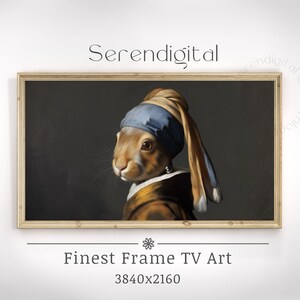 May include: A framed digital art print of a brown rabbit wearing a blue and yellow turban and a pearl earring. The rabbit is looking to the left. The print is titled "Finest Frame TV Art 3840x2160".