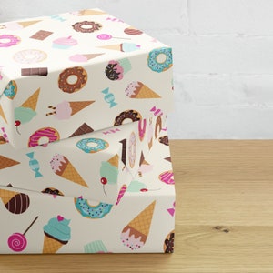 Sweet Celebration: Festive Birthday Wrapping Paper with Ice Cream Cones, Donuts, Chocolate Bars, Candy, and Lollipops