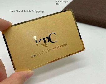 May include: Gold metal business card with a gold border and the text "KPC" and "www.KPCimport.com".