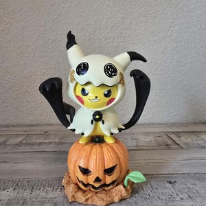 Poncho Pikachu Statues
