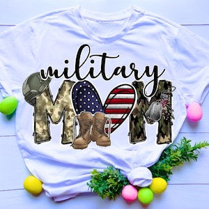 May include: White t-shirt with a camouflage print design that says "military mom" with a heart and boots.
