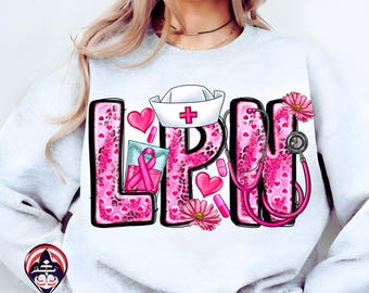 May include: A white sweatshirt featuring the letters "LPN" in a pink leopard print design with black outlines. The design includes a nurse's hat, stethoscope, pink hearts, pills, and a pink ribbon.