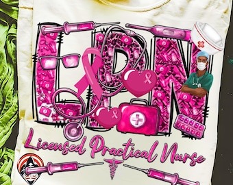 May include: Cream-colored t-shirt featuring a pink and white design with the letters "LPN" and medical-themed illustrations. The words "Licensed Practical Nurse" are written in pink script below the design. Includes a stethoscope, syringes, and a nurse.