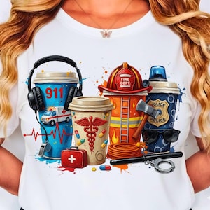 May include: White t-shirt featuring coffee cup designs representing emergency services. Designs include a 911 cup with an ambulance, a medical cup with a caduceus, a firefighter cup with a helmet, and a police cup with handcuffs.