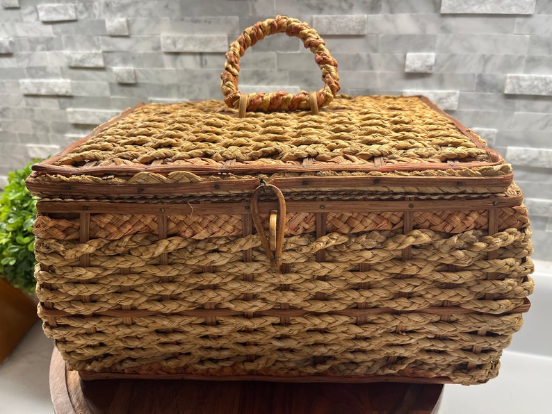 Antique wicker sewing basket with red silk lining image 1