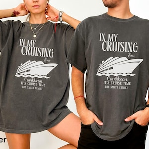 May include: Two gray t-shirts with a white graphic of a cruise ship and the text "In My Cruising Era" and "Caribbean It's Cruise Time The Smith Family".