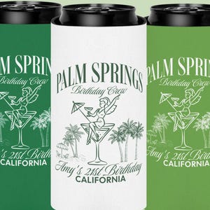 May include: Three drinks can coolers in green and white, each with a black top. The coolers feature the text "PALM SPRINGS Birthday Crew" and a graphic of a woman in a martini glass. The text "Amy's 21st Birthday CALIFORNIA" is also present.