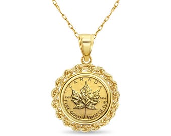 May include: A gold necklace with a pendant featuring a Canadian gold maple leaf coin. The coin is surrounded by a rope-like border and has the inscription "CANADA FINE GOLD 1/10 OZ OR PUR 9999".
