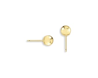 Può includere: Due orecchini a bottone color oro con un design sferico. Gli orecchini sono esposti su sfondo bianco. Gli orecchini hanno un perno e una sfera rotonda e lucida. Gli orecchini sono probabilmente in oro.