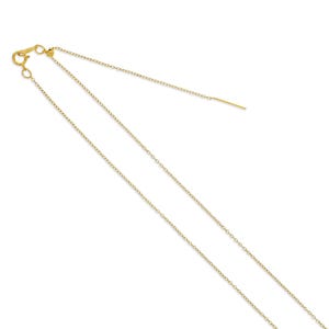 May include: A delicate gold necklace with a fine chain and adjustable length. The necklace features a small clasp and a slender bar at the end of the adjustable chain. The jewelry is displayed against a white background.