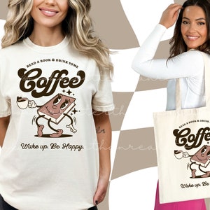 May include: A white tote bag with a brown cartoon coffee cup and book design. The text on the bag reads "Read a book & drink some Coffee. Wake up. Be Happy."