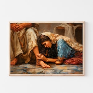 Puede incluir: Una impresión enmarcada de una escena religiosa. Una mujer con ropa azul y roja se arrodilla, con la cabeza inclinada, cerca de una persona con una túnica crema. La obra de arte tiene una paleta de colores cálidos y un suelo reflectante.