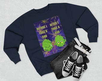May include: Navy blue sweatshirt featuring a graphic with two cartoon cannabis buds. The text reads "BEFORE I TAKE A DAB" and "AFTER I TAKE A DAB". The image is paired with black jeans and black and white sneakers.