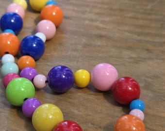 Multi coloured phone wristlet