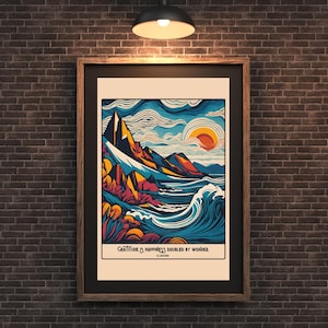 Pode incluir: Uma impressão emoldurada com uma ilustração colorida de uma cordilheira e ondas do oceano. O texto "Gratitude is happiness doubled by wonder" está impresso na parte inferior da impressão.