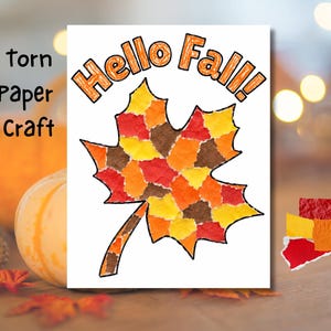 May include: A paper craft project featuring a large maple leaf outline filled with small, torn pieces of red, orange, yellow, and brown paper. Above the leaf, the text reads Hello Fall! in orange letters with a black outline on a white background.