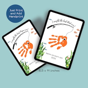 May include: Two digital art prints on tablets, each featuring an orange handprint fish design with the text "I caught the best Papa ever!" and "Happy Father's Day 2026". The prints are 8.5 x 11 inches.