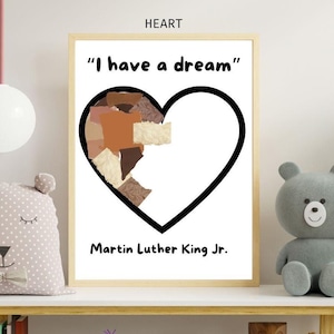 May include: Framed art print featuring a black heart outline with a collage of brown and beige paper pieces. The text "I have a dream" is above the heart, and "Martin Luther King Jr." is below.