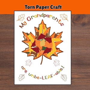 May include: A white rectangular card featuring a large maple leaf made of multicolored torn paper scraps in shades of orange, yellow, red, and brown. The text reads My Grandparents are unbe-LEAF-able! with small leaf outlines surrounding it.
