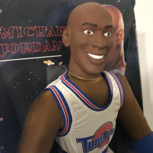 Rare find. Vintage Michael Jordan ”Space Jam” figure.  Box is 26 1/8” x 11.34  Michael Jordan Figure 25 inches