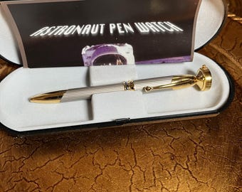 Very rare Pen a Time® zero gravity pen watch in original case and box.