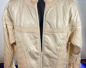 Stylish vintage knitted and leather winter zipper jacket by Madame of The Hilton San Francisco.
