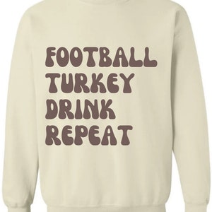 Football Turkey Drink Repeat Crewneck Sweatshirt