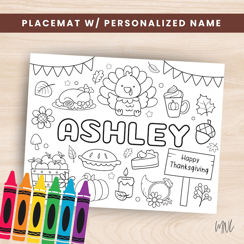 May include: A white placemat with the text "ASHLEY" and Thanksgiving-themed illustrations, including a turkey, pumpkin, and pie. The placemat is designed for coloring and includes a set of crayons.