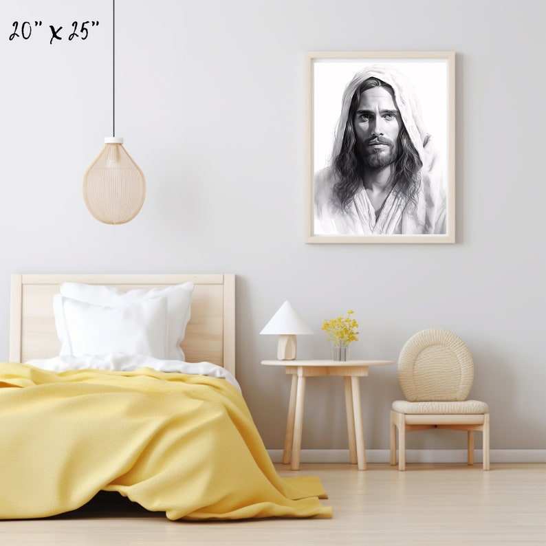 May include: A black and white framed print of a portrait of Jesus Christ. The print is hanging on a white wall in a bedroom setting. The print is 20 inches by 25 inches.