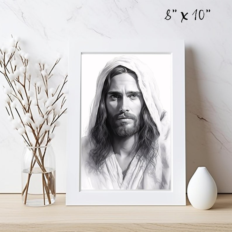 May include: A black and white drawing of Jesus Christ with long hair and a beard. He is wearing a white robe and has a gentle expression on his face.