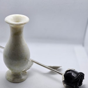 Jade vase and crystal rose