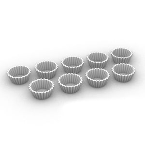 Könnte beinhalten: Zehn weiße Papier-Muffinformen in versetzter Anordnung auf einer weißen Oberfläche.