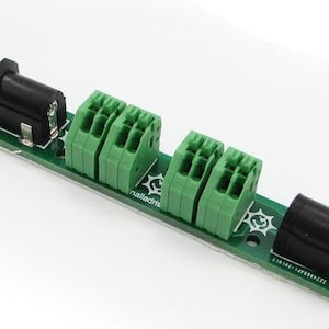 Spring-loaded terminal block