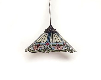May include: A stained glass pendant light with a floral design in shades of pink, blue, and green. The light has a brown metal frame and a white background.