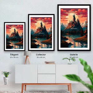 May include: A framed print of a digital painting depicting Hogwarts castle in a landscape setting. The castle is illuminated by a large, full moon in a red and orange sky. The text "HOGWARTS" is visible on the castle.