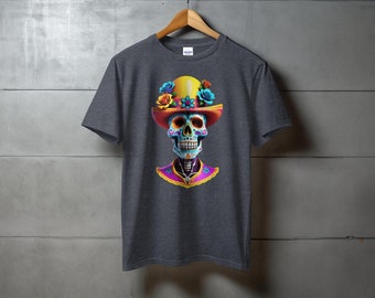 May include: A dark grey t-shirt with a colorful sugar skull wearing a yellow sombrero with pink and blue flowers. The skull has blue eyes and a pink nose.