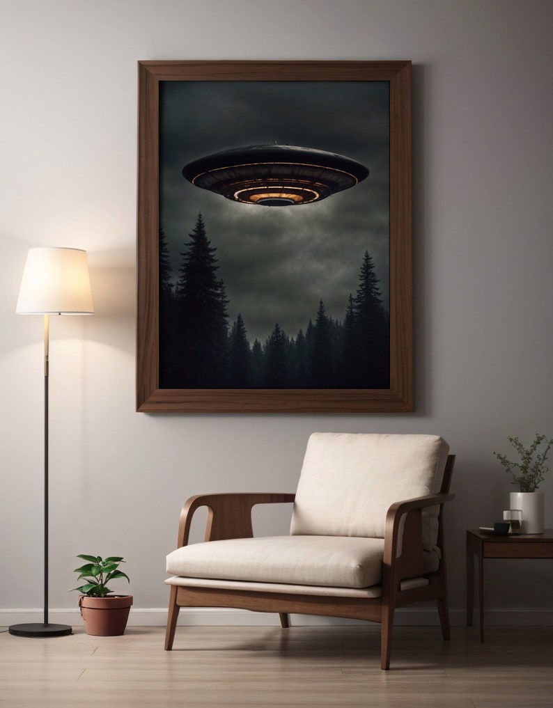 May include: A framed print depicting a dark, cloudy sky with a flying saucer hovering over a forest of tall, dark trees.
