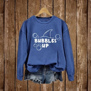 Bubbles Up Jimmy Sweatshirt, Jimmy Buffett Memorial T-Shirt, Women's Bubbles Up Jimmy Long-Sleeve
