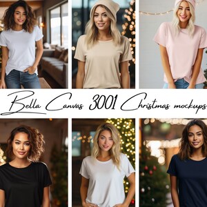 May include: Six women wearing different colored t-shirts in front of a Christmas tree backdrop. The t-shirts are blank and ready for customization. Bella Canvas 3001 Christmas Mockups.