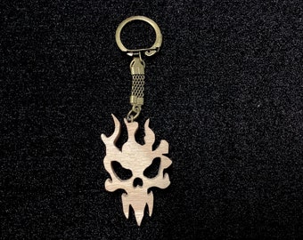 Schlüsselanhänger aus Holz (Buche) in Form eines Monsters, handgefertigtes, einzigartiges Objekt.