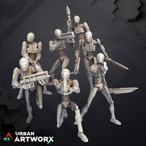 May include: A set of six gray, articulated, humanoid figures holding various weapons. The figures are posed in a variety of action stances. The figures are made of a smooth, matte material.