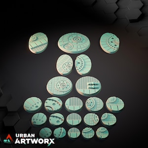 May include: A collection of twenty-one light mint green circular and oval miniature bases featuring intricate mechanical, industrial, and grid-like textures. Each base displays unique geometric patterns, including concentric circles, metal plating, and mesh designs.