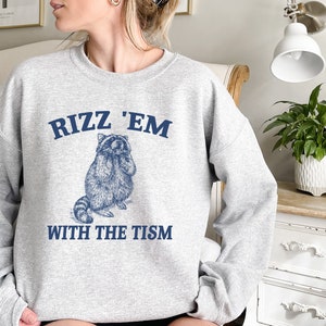 Rizz Em With The Tism Retro Sweatshirt, Vintage Funny Raccoon Graphic Shirt, Autism Awareness, Raccoon Meme Shirt, cute Raccoon shirt