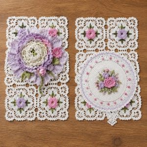 May include: Two rectangular white crochet doilies featuring intricate lace patterns. The left doily displays a large, layered lavender and cream floral applique. The right doily features a circular center with a small pink and purple floral cluster.