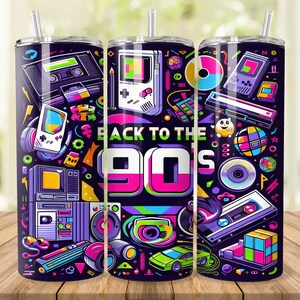 May include: A colourful tumbler with a 90s theme. The tumbler features a variety of retro icons, including video game consoles, cassette tapes, and a record player. The text "Back to the 90s" is printed on the tumbler.
