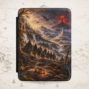 May include: A rectangular e-reader case featuring a detailed fantasy illustration of a group of travelers walking through a mountainous landscape toward a glowing volcano, with a golden ring resting on a rock in the foreground.