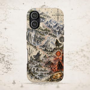 May include: A smartphone case featuring a detailed fantasy map illustration. The design depicts a winding red path through mountains, forests, and a white castle, with figures of a wizard, a warrior, and a fiery eye. A golden ring sits at the bottom.