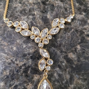 Oscar de la Renta necklace.