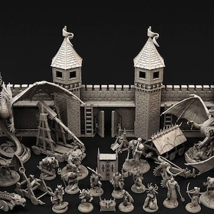 May include: A collection of unpainted gray miniature figures and modular castle wall sections. The set includes two large winged dragons, various armored warriors, siege engines, and stone-textured fortifications with towers and wooden gates.