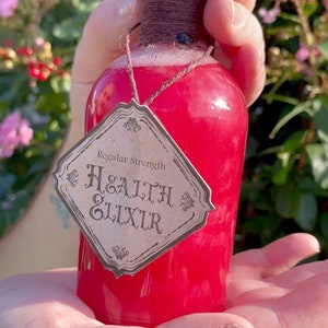 Health Elixir Shimmering Red Potion Cosplay Accessory + Decor Sensory Round Bottle With Belt Loop